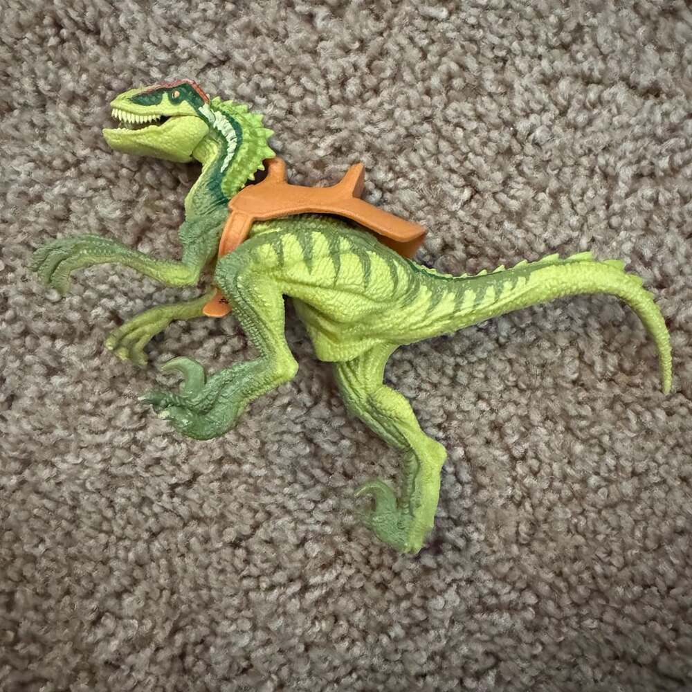 Jurassic World Velociraptor Dinosaur Figure with Saddle Green